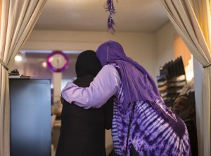 PIC - MUSLIM WOMAN HUGGING